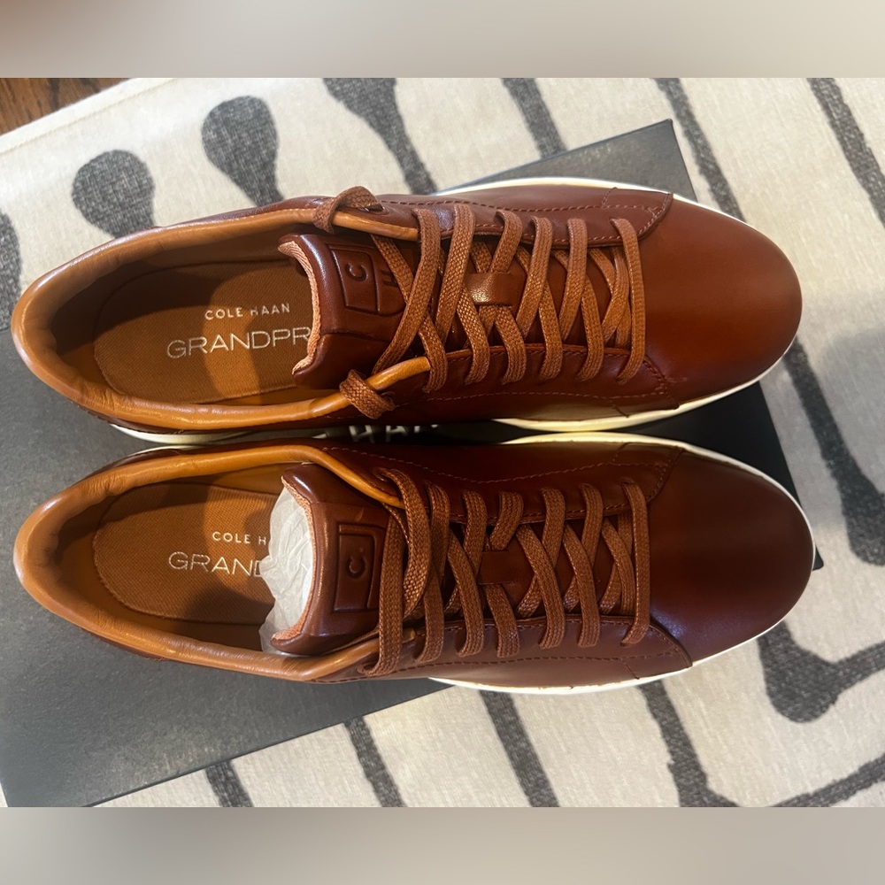 Men’s 8.5 Cole Haan Grandpro tennis sneaker. New in box. Never worn.